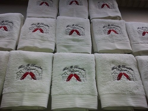 Logo borduren handdoeken